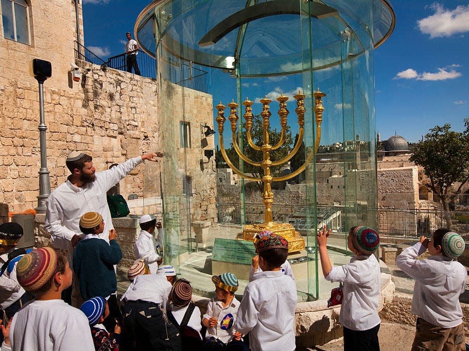 A full-size recreation of the seven-branched menorah used in the ancient Temple on display in Jerusalem.