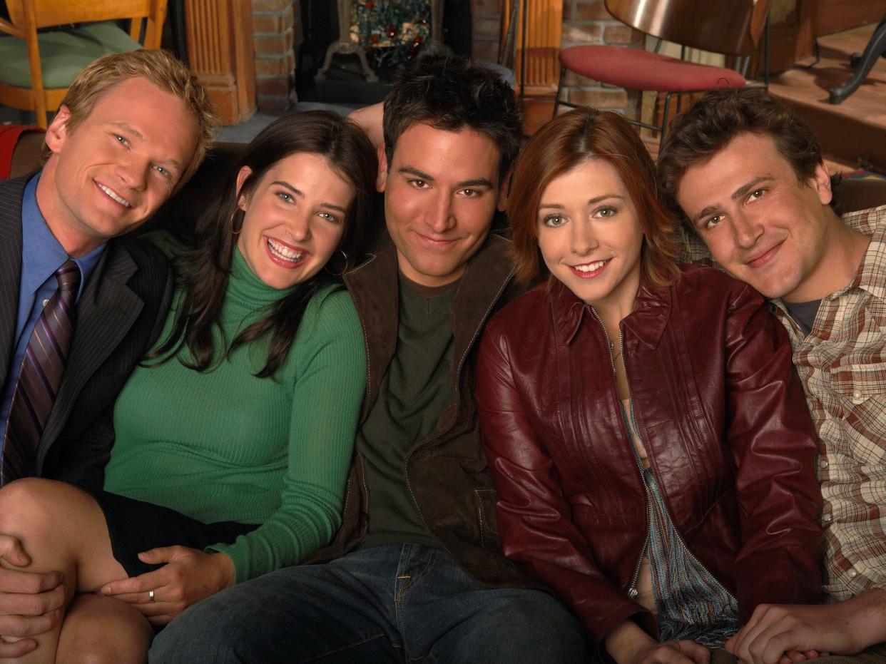From left: "How I Met Your Mother" costars Neil Patrick Harris,Cobie Smulders, Josh Radnor, Alyson Hannigan, and Jason Segel sitting together.