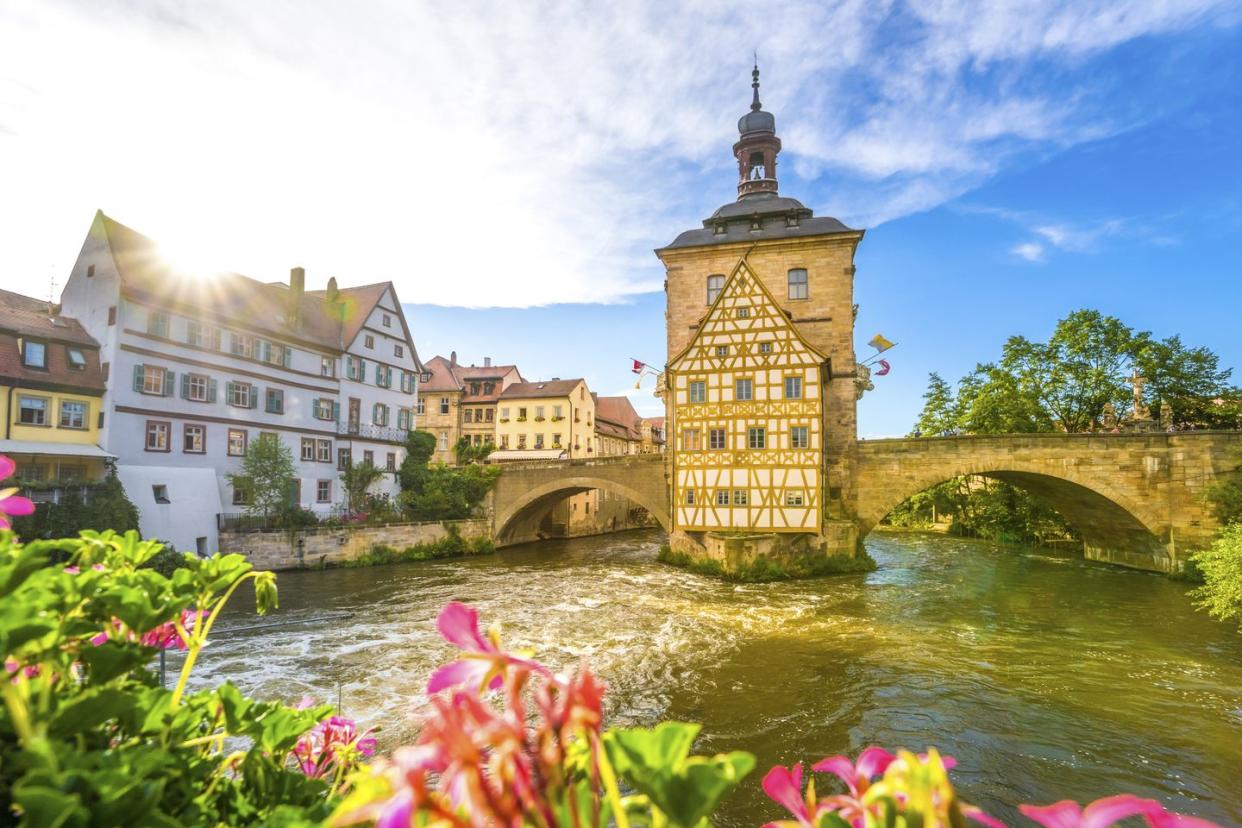 germany, bavaria, bamberg, regnitz river with old townhall