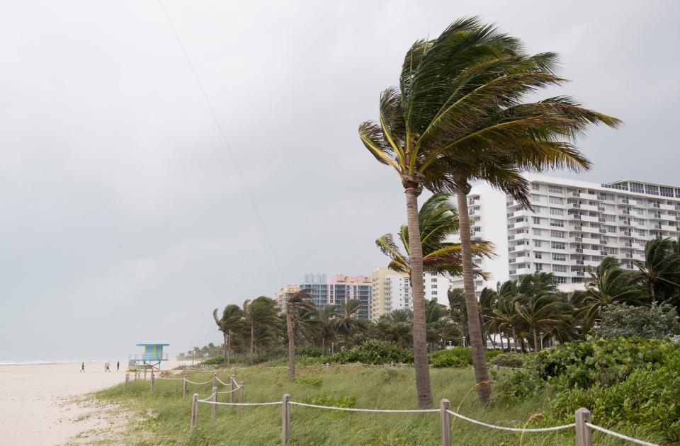 Winds and rain begin to hit the beach as outer bands of Hurricane Irma arrive in Miami Beach, Florida, September 9, 2017. Hurricane Irma weakened slightly to a Category 4 storm early Saturday, according to the US National Hurricane Center, after making landfall hours earlier in Cuba with maximum-strength Category 5 winds. / AFP PHOTO / SAUL LOEB        (Photo credit should read SAUL LOEB/AFP/Getty Images)