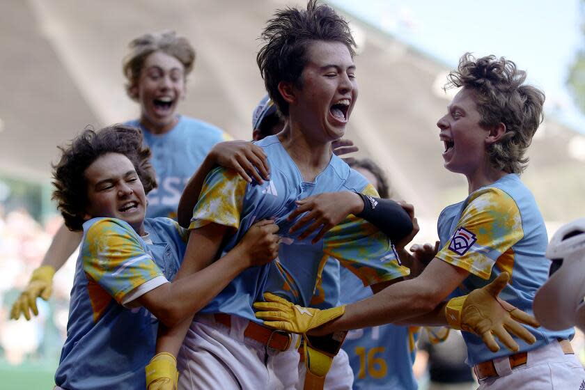 SOUTH WILLIAMSPORT, PENNSYLVANIA - AUGUST 27: Louis Lappe #19 of the West Region team from El Segundo, California celebrates with teammates after hitting a walk-off home run to defeat the Caribbean Region team from Willemstad, Curacao during the Little League World Series Championship Game at Little League International Complex on August 27, 2023 in South Williamsport, Pennsylvania. (Photo by Tim Nwachukwu/Getty Images)