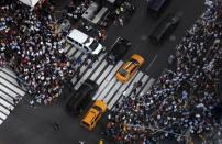 Some of several thousand protestors crowd into 7th Avenue at 42nd street as they demonstrate during a rally apposing the nuclear deal with Iran in Times Square in the Manhattan borough of New York City, July 22, 2015. REUTERS/Mike Segar