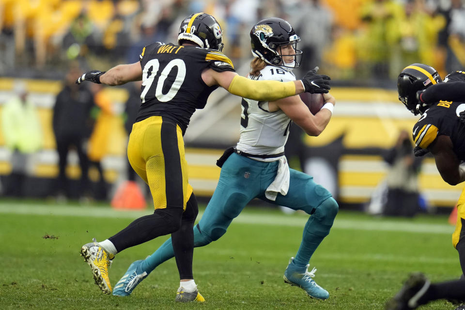 Jacksonville Jaguars quarterback Trevor Lawrence (16) is sacked by Pittsburgh Steelers linebacker T.J. Watt (90) during the second half of an NFL football game Sunday, Oct. 29, 2023, in Pittsburgh. (AP Photo/Gene J. Puskar)