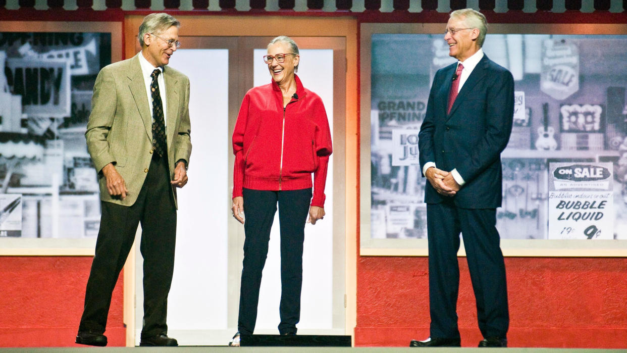 Jim Walton, left, Alice Walton, center, and Rob Walton, right, children of Walmart Inc.