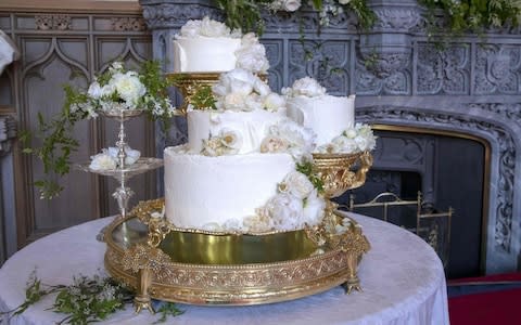 The wedding cake features elderflower syrup made at The Queens residence in Sandringham - Credit: AFP