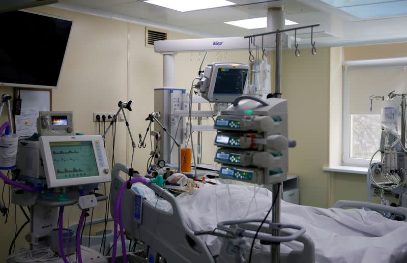 FILE PHOTO: Medical workers take care of the coronavirus disease (COVID-19) patients at a hospital in Moscow