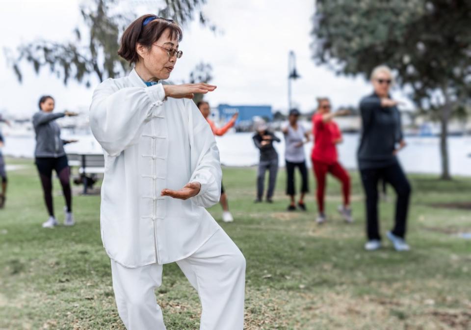 Exercises like tai chi should be done for 30 to 60 minutes a day, three to five times a week, Shah says. Natalie – stock.adobe.com