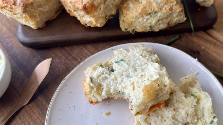 Cream cheese cheddar biscuit cut on plate