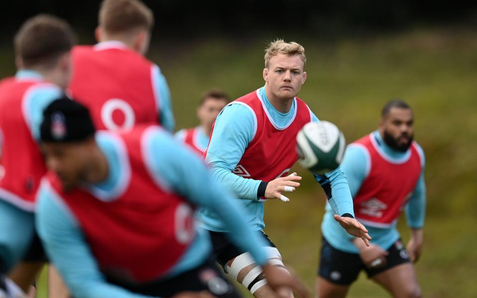 David Ribbans of England gathers a pass during a training session at Pennyhill Park on March 13, 2023 in Bagshot, England - Getty Images/Dan Mullan