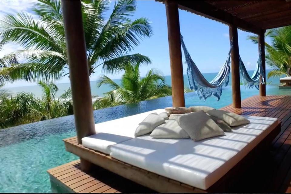 <p>The day bed and hammocks really enhance the 'Gram' potential of this particular pool.</p><p>Book via: <a href="https://www.airbnb.co.uk/rooms/17975104?guests=3&adults=3&location=brazil&s=-xqAlzja" rel="nofollow noopener" target="_blank" data-ylk="slk:Airbnb;elm:context_link;itc:0;sec:content-canvas" class="link ">Airbnb</a></p>