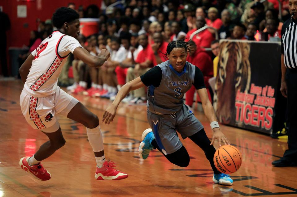 Ribault's Caleb Williams (3) dribbles against Jackson's Jakauri Fisher (12) during the third quarter against Jackson. Williams committed to Lafayette men's basketball.