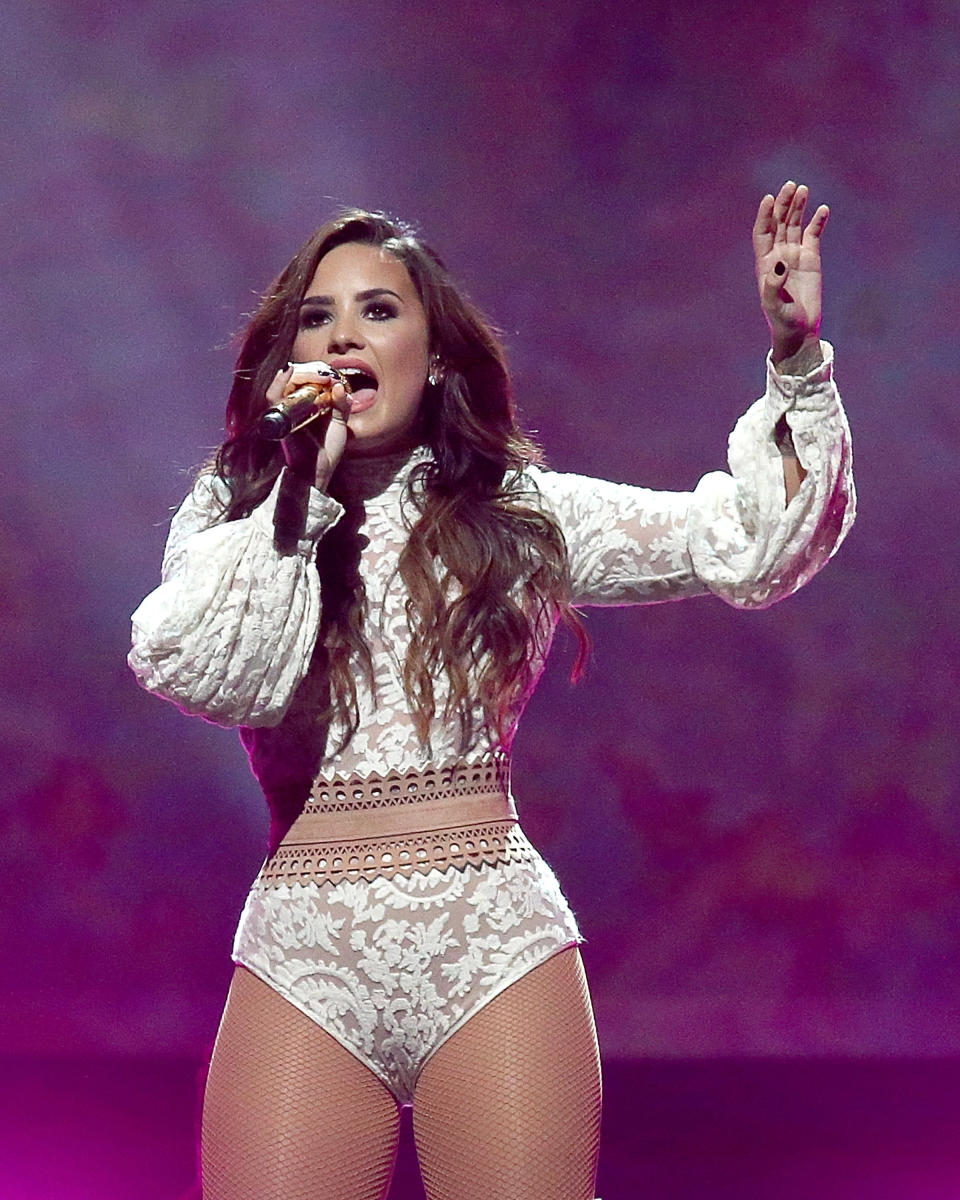 Demi Lovato performs in concert with Nick Jonas at the AT&amp;T Center.