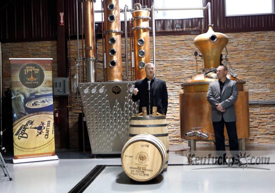 Distillers and co-owners, Shane Baker, left, and Pat Heist, right, spoke during the grand opening ceremony at Wilderness Trace Distillery (now named Wilderness Trail Distillery) in Danville, Ky., Friday, December 6, 2013. The grand opening featured a ribbon cutting and barreling ceremony along with a celebratory toast.