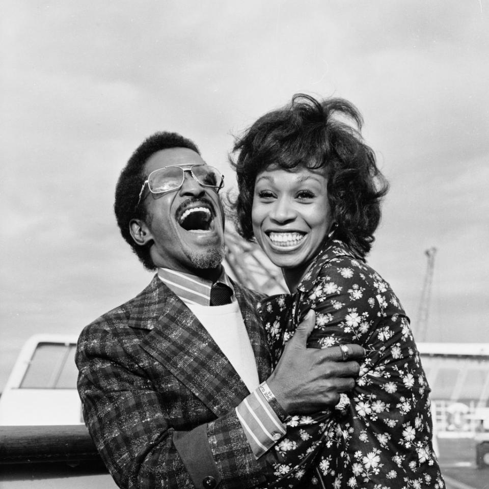 <p>The Rat Pack member cracks up with his new wife during their trip to England. Here, they arrive at the Queen Elizabeth II Cruise Terminal in Southampton. </p>