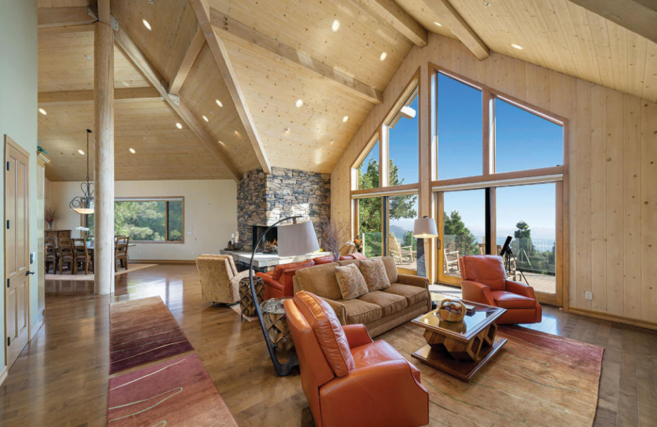 This four-bedroom, 4,139-square-foot residence in Idyllwild is listed with Douglas Elliman’s Cory Weiss for .495 million and sits on 180 acres. - Credit: Courtesy of Blake Daryaie/Douglas Elliman Realty