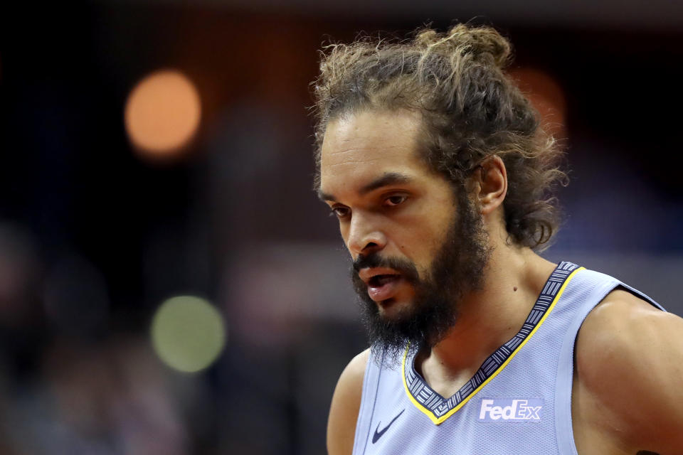 Joakim Noah #55 of the Memphis Grizzlies looks on in the first half against the Washington Wizards at Capital One Arena on March 16, 2019 in Washington, DC. NOTE TO USER: User expressly acknowledges and agrees that, by downloading and or using this photograph, User is consenting to the terms and conditions of the Getty Images License Agreement. (Photo by Rob Carr/Getty Images)