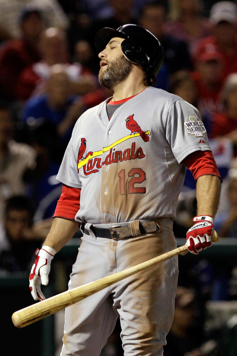 ARLINGTON, TX - OCTOBER 24: Lance Berkman #12 of the St. Louis Cardinals reacts after striking out in the fourth inning during Game Five of the MLB World Series against the Texas Rangers at Rangers Ballpark in Arlington on October 24, 2011 in Arlington, Texas. (Photo by Rob Carr/Getty Images)