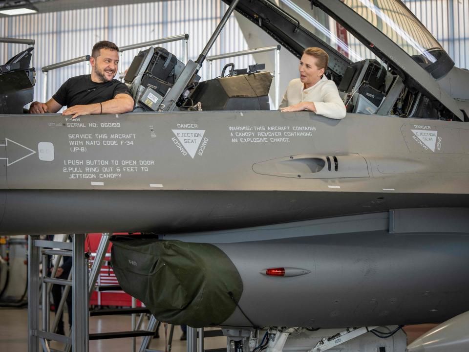 Ukrainian President Volodymyr Zelenskyy and Danish Prime Minister Mette Frederiksen in a F-16 in Denmark on August 20, 2023.