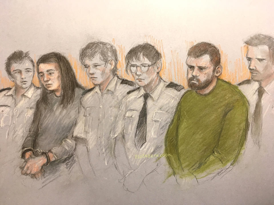 Court artist sketch of the pair in court flanked by security staff as they sit in the dock at Sheffield Crown Court (Elizabeth Cook/PA Wire)