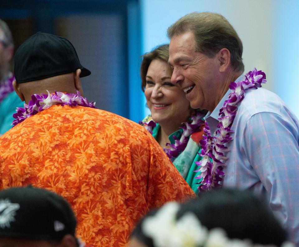 Terry and Nick Saban greet Galu Tagovailoa, Tua’s father, during the Luau with Tua at The Zone inside Bryant-Denny Stadium in Tuscaloosa Wednesday, April 13, 2022. The event raises money for the Tua Foundation, the Boys & Girls Clubs of West Alabama, and Nick's Kids. Gary Cosby Jr./Tuscaloosa News  