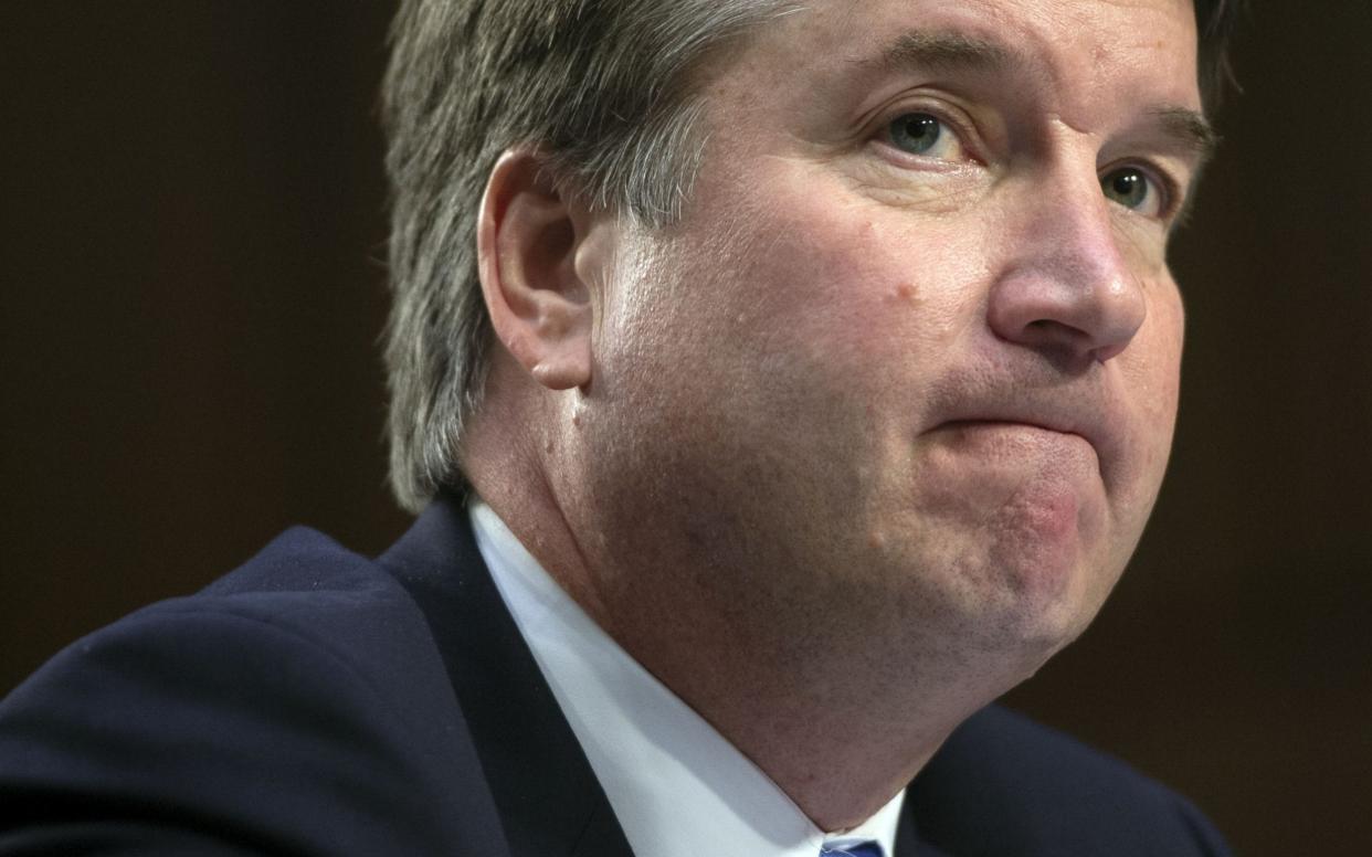 Donald Trump's Supreme Court nominee, Brett Kavanaugh, is losing support after a woman accused him of sexual assault in the early 1980s - AFP