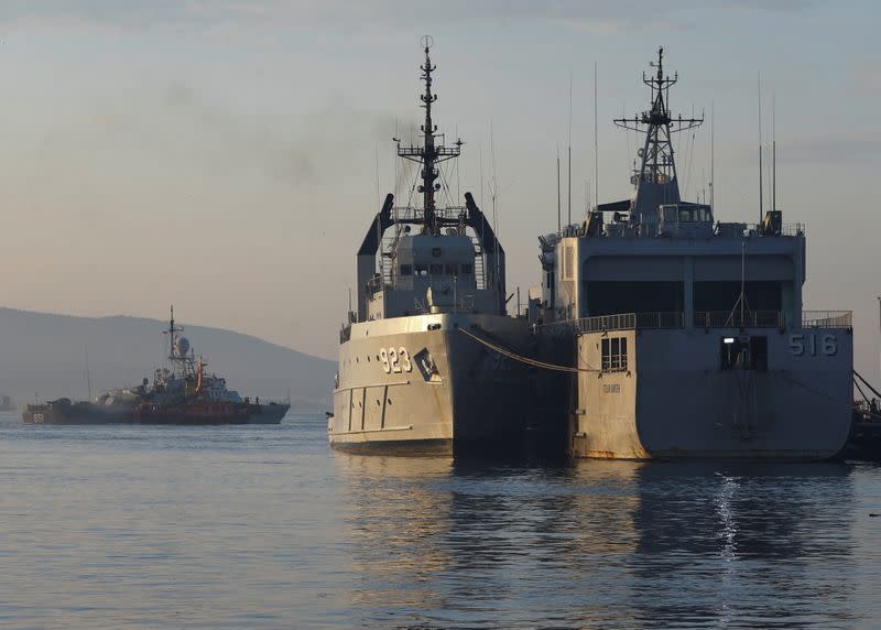 Indonesian Navy's ships are seen at the Tanjung Wangi port as the search continues for the missing KRI Nanggala-402 submarine