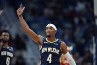 New Orleans Pelicans guard Devonte' Graham (4) reacts after making a 3-point basket in the first half of an NBA basketball game against the Atlanta Hawks in New Orleans, Wednesday, Oct. 27, 2021. (AP Photo/Gerald Herbert)