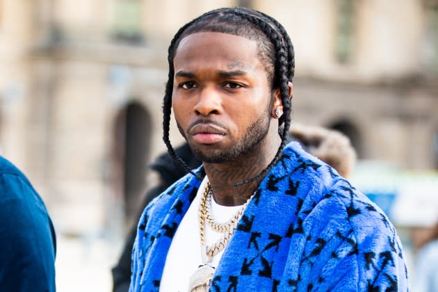 Rapper Pop Smoke attend the Off-White Menswear Fall/Winter 2020-2021 show as part of Paris Fashion Week on January 15, 2020 in Paris, France.  - Credit: Claudio Lavenia/Getty Images