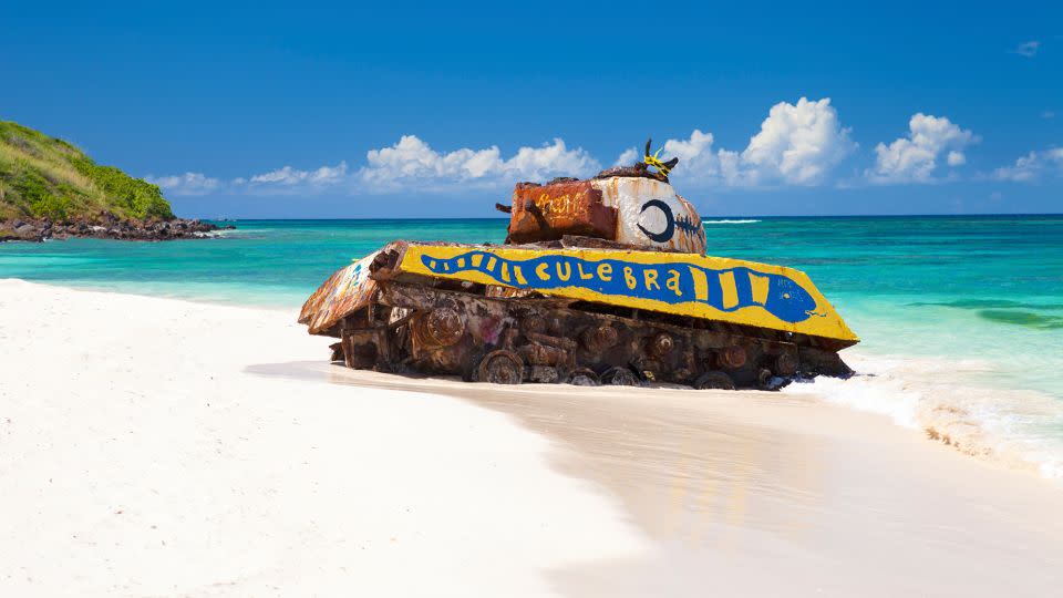 A rusting tank makes for unusual beachcombing on Culebra's Flamenco Beach. - cdwheatley/iStockphoto/Getty Images
