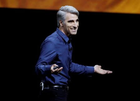 Craig Federighi, Senior Vice President of Software Engineering for Apple Inc, discusses the macOS Sierra at the company's World Wide Developers Conference in San Francisco, California, U.S. June 13, 2016. REUTERS/Stephen Lam