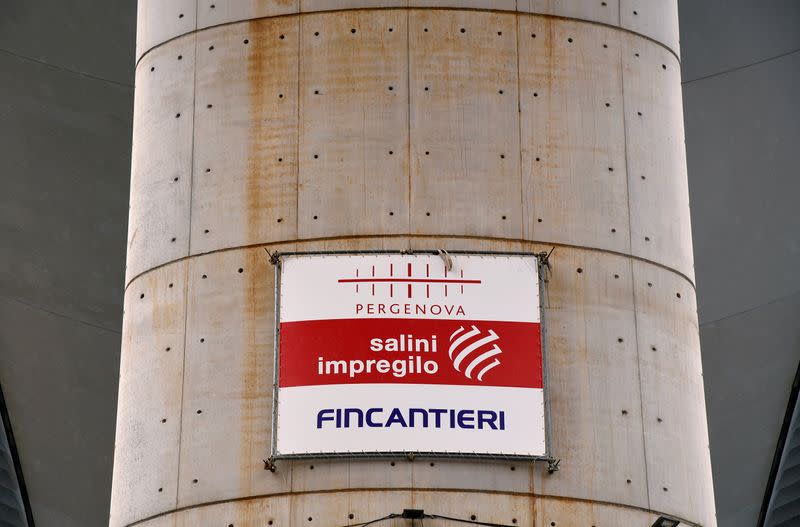 The logos of infrastructure groups Salini Impregilo and Fincantieri are pictured on the new Genoa bridge ahead of its official inauguration, in Genoa