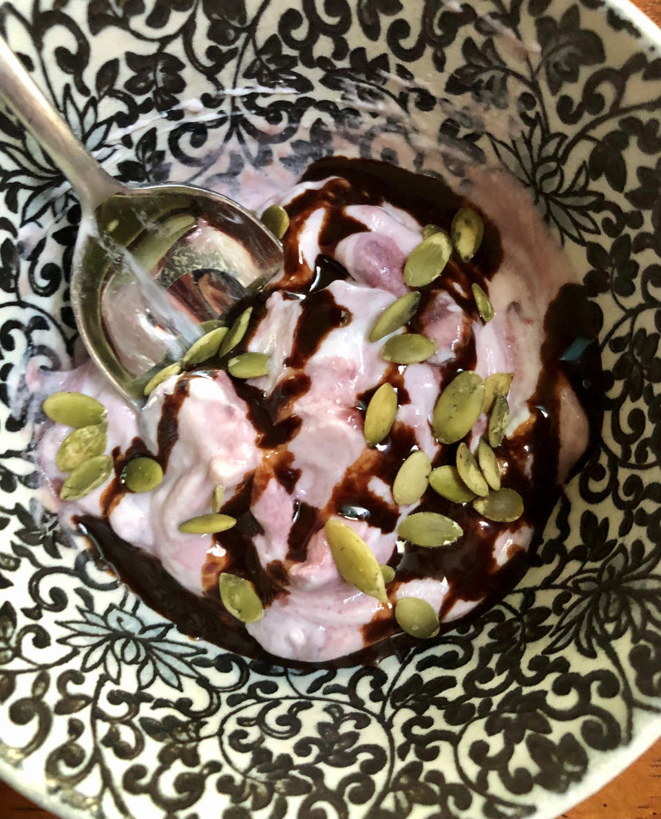 Chobani cherry Greek yogurt with Go Raw pumpkin seeds and a little Hershey’s Simple Chocolate Syrup.
 (Heather Martin)