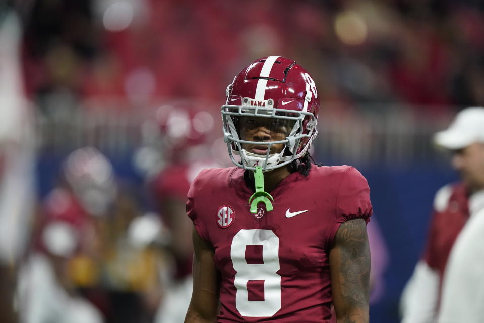 Alabama wide receiver John Metchie III (8) warms up before the first half of the Southeastern Conference championship NCAA college football game between Georgia and Alabama, Saturday, Dec. 4, 2021, in Atlanta. (AP Photo/Brynn Anderson)