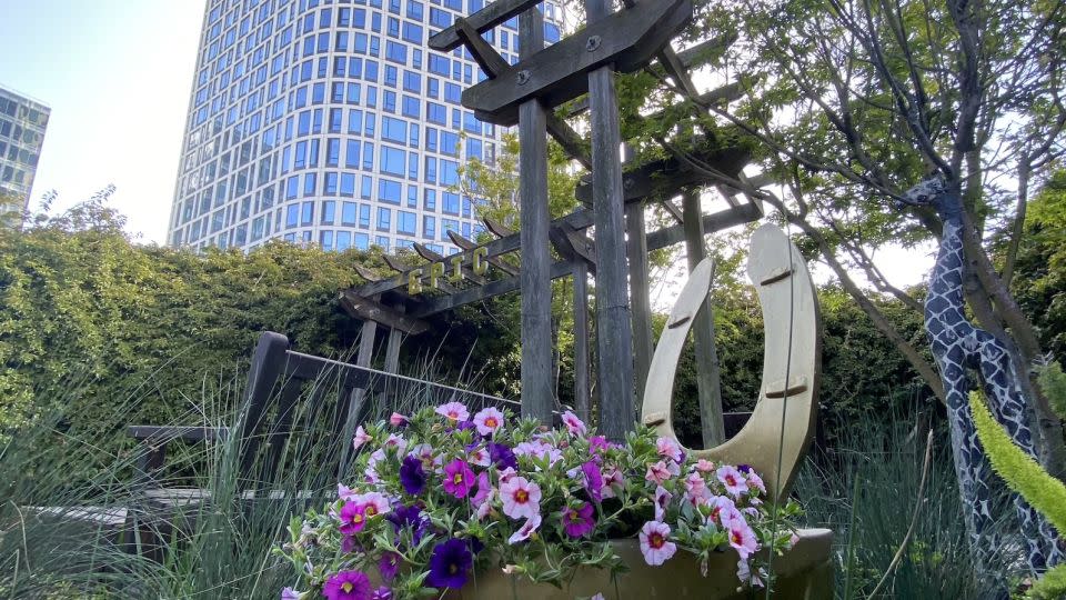 A view of Fifteen Fifty, in San Francisco, from a nearby garden where plants are grown using recycled waste from Epic Cleantec's water treatment system. - Epic Cleantec