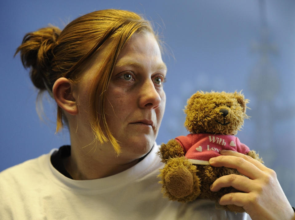 Karen Matthews the mother of missing 9-year-old Shannon Matthews holds her daughters favourite teddy bear as she makes an emotional appeal for her safe return today.