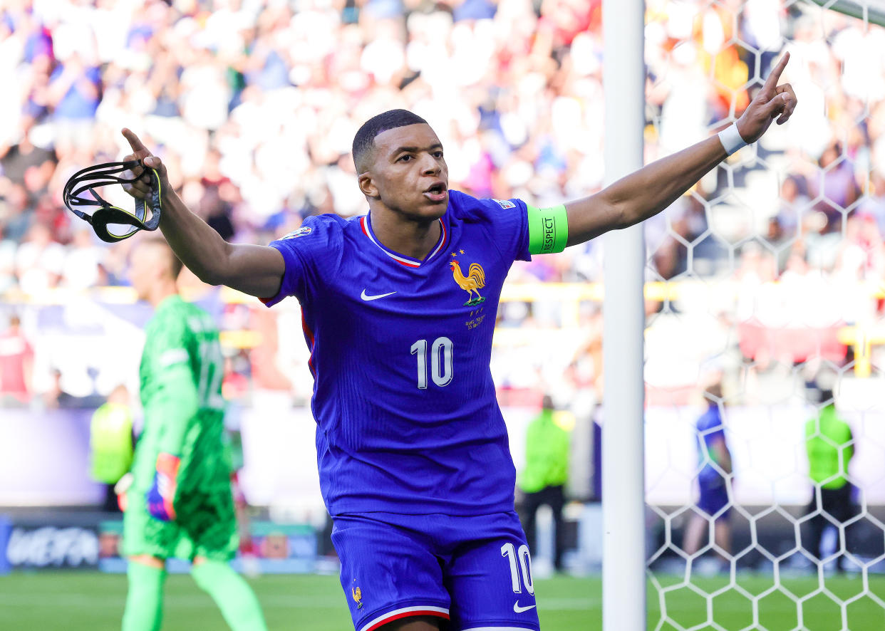 DORTMUND, GERMANY - JUNE 25: Kylian Mbappe of France celebrates his teams first goal during the UEFA EURO 2024 group stage match between France and Poland at Football Stadium Dortmund on June 25, 2024 in Dortmund, Germany.(Photo by Ralf Ibing - firo sportphoto/Getty Images)