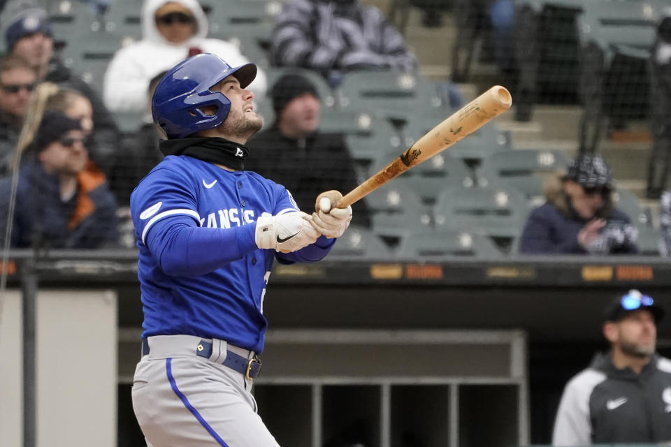 Kansas City Royals' Andrew Benintendi watches his RBI single off Chicago White Sox's Dylan Cease during the sixth inning of a baseball game Wednesday, April 27, 2022, in Chicago. (AP Photo/Charles Rex Arbogast)