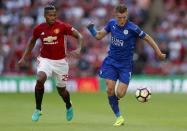 Football Soccer Britain - Leicester City v Manchester United - FA Community Shield - Wembley Stadium - 7/8/16 Manchester United's Antonio Valencia in action with Leicester City's Jamie Vardy Action Images via Reuters / John Sibley Livepic EDITORIAL USE ONLY. No use with unauthorized audio, video, data, fixture lists, club/league logos or "live" services. Online in-match use limited to 45 images, no video emulation. No use in betting, games or single club/league/player publications. Please contact your account representative for further details.