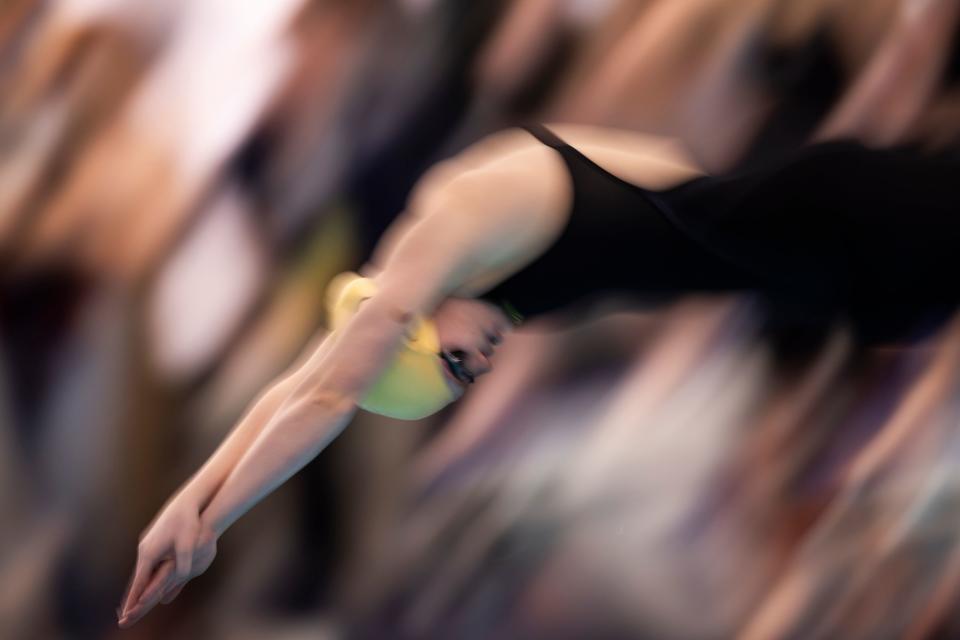 A swimmer from Lone Peak High School competes in the Women’s 400 Free Relay at the Utah 6A State Meet at the Stephen L. Richards Building in Provo on Saturday, Feb. 24, 2024. | Marielle Scott, Deseret News