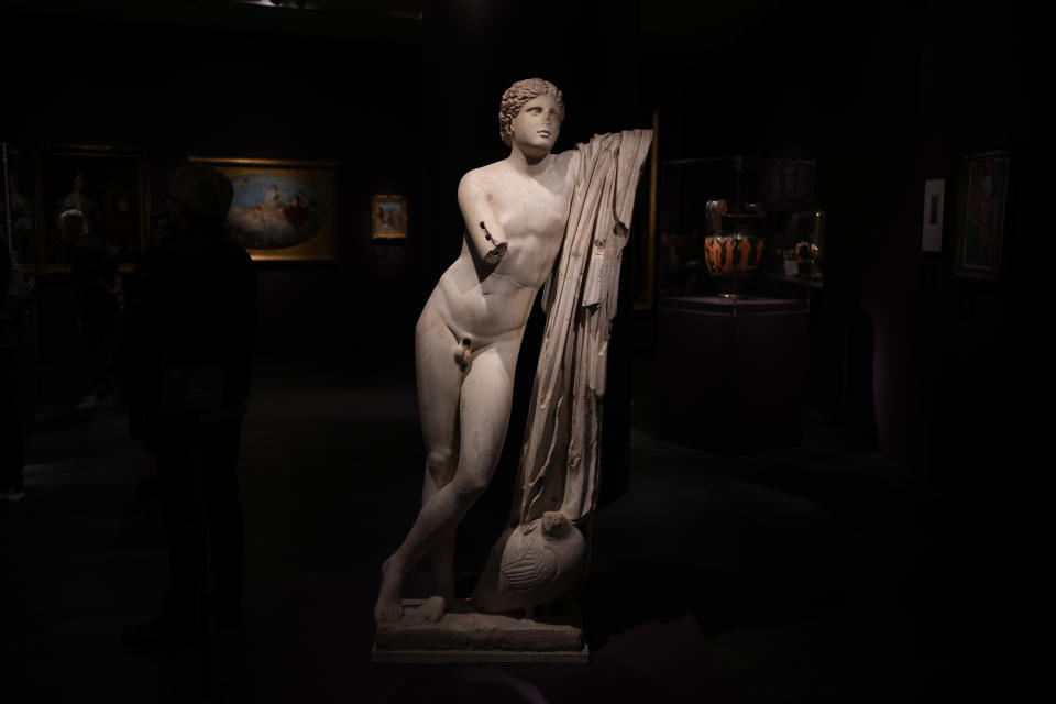 The Statue of Pothos (Lust) A.D. 150-200 is on display ahead of the Greece's Acropolis Museum official launch of an exhibition, in Athens, Tuesday, Dec. 5, 2023. The artifact will be displayed as part of an exhibition "Meanings: Personifications and Allegories, from Antiquity to Today" that will include 165 works of art, many from leading European museums and many being loaned for the first time. (AP Photo/Thanassis Stavrakis)