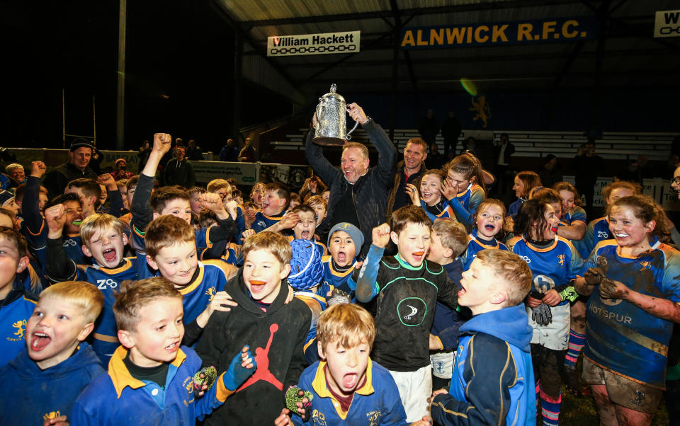 Former Scotland star Andy Nicol raises the Calcutta Cup at an event at Alnwick Rugby Football Club ahead of the match against England