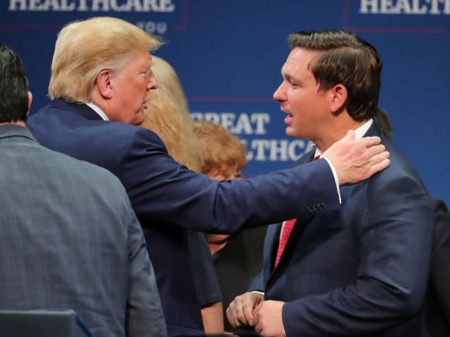 President Donald Trump and Florida Gov. Ron DeSantis meet in The Villages, Florida, Thursday, Oct. 3, 2019. The two presidential candidates sparred over Disney this week. (Joe Burbank/Orlando Sentinel/Tribune News Service via Getty Images)