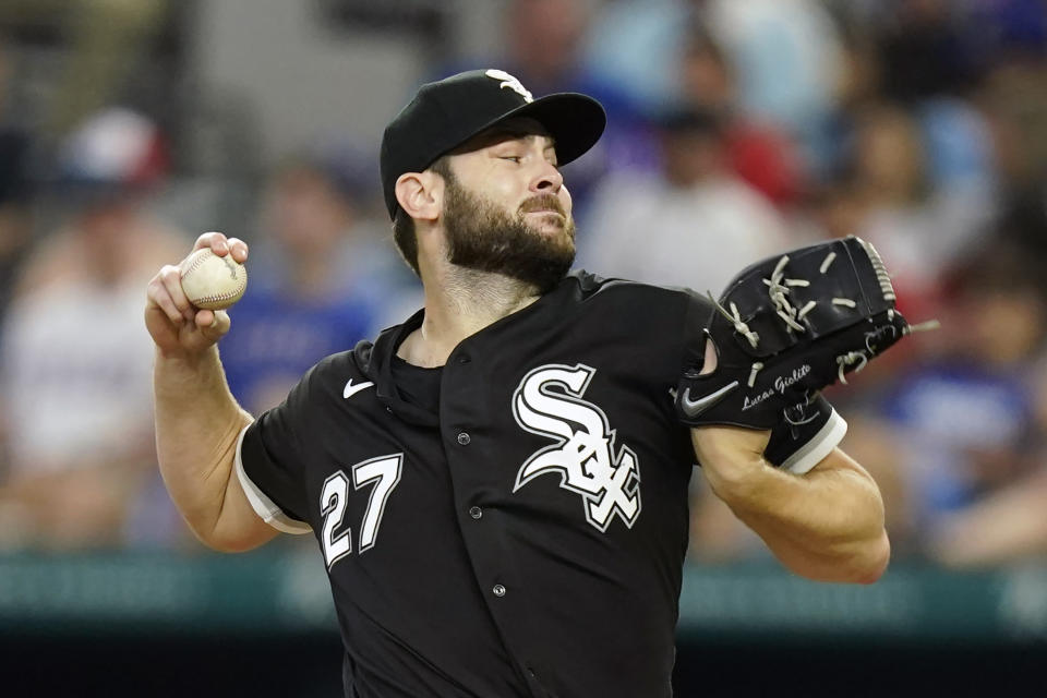 Chicago White Sox starting pitcher Lucas Giolito throws during the first inning of a baseball game against the Texas Rangers in Arlington, Texas, Sunday, Aug. 7, 2022. (AP Photo/LM Otero)