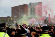 Manchester United fans protest against their owners before the Manchester United v Liverpool Premier League match