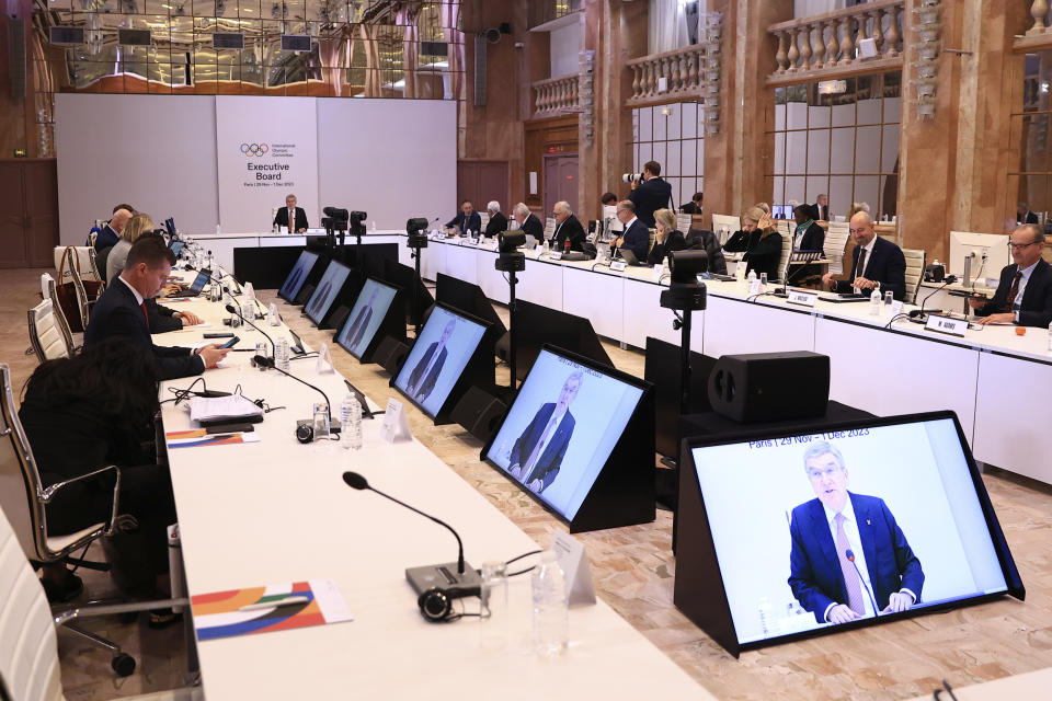 International Olympic Committee (IOC) president Thomas Bach, center, chairs an IOC Executive Board meeting to discuss the Paris 2024 olympic plans and the upcoming editions of the Olympic Games, Wednesday, Nov. 29, 2023 in Paris. IOC executive board members will also meet with the Paris 2024 Organising Committee and visit a venue. (AP Photo/Aurelien Morissard)