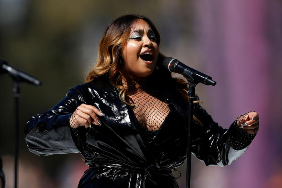 Jessica Mauboy singing at a concert