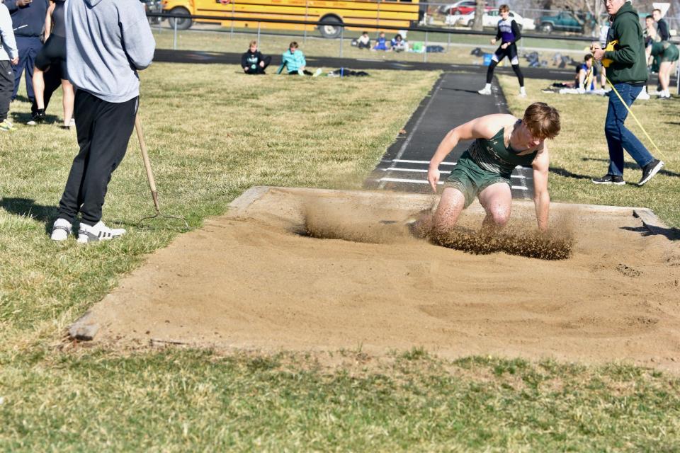 A Woodward-Granger athlete competes in the long jump during the Cavanaugh Relays on Thursday, April 6, 2023, at Hawk Stadium in Woodward.