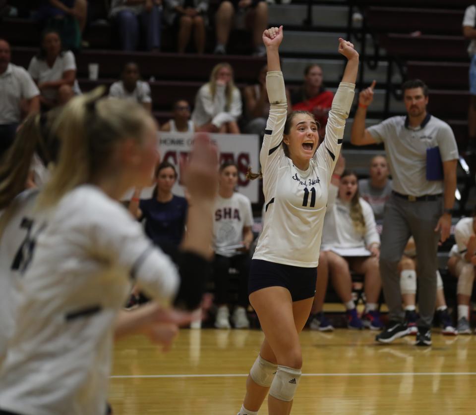 Sacred Heart’s Kaeley Walz celebrated their score against Assumption.
Aug. 29, 2023