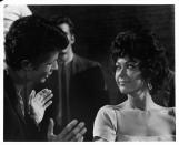 <p>Amid diamonds and pearls, don't forget about Rita Moreno's classic gold hoop earrings in <em>West Side Story</em>. The actress paired them with her square neck dress when she played Anita in the 1961 film. </p>