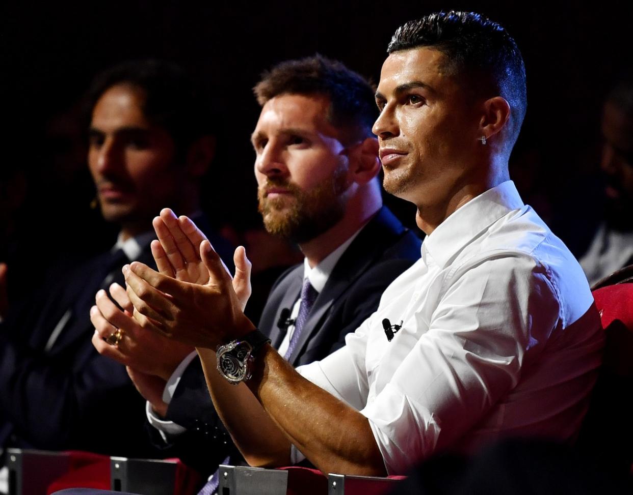 Cristiano Ronaldo and Lionel Messi didn't have much reason to smile after the Champions League group stage draw. (Getty)